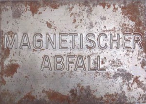 Joseph Beuys - Magnetische Postkarte (Magnetic Postcard), 1975, sheet iron with raised, impressed lettering, magnet, stamped
